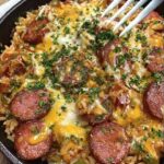 Cheesy Smoked Sausage Rice Skillet