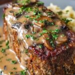 Homemade Meatloaf with Rich and Creamy Mushroom Gravy