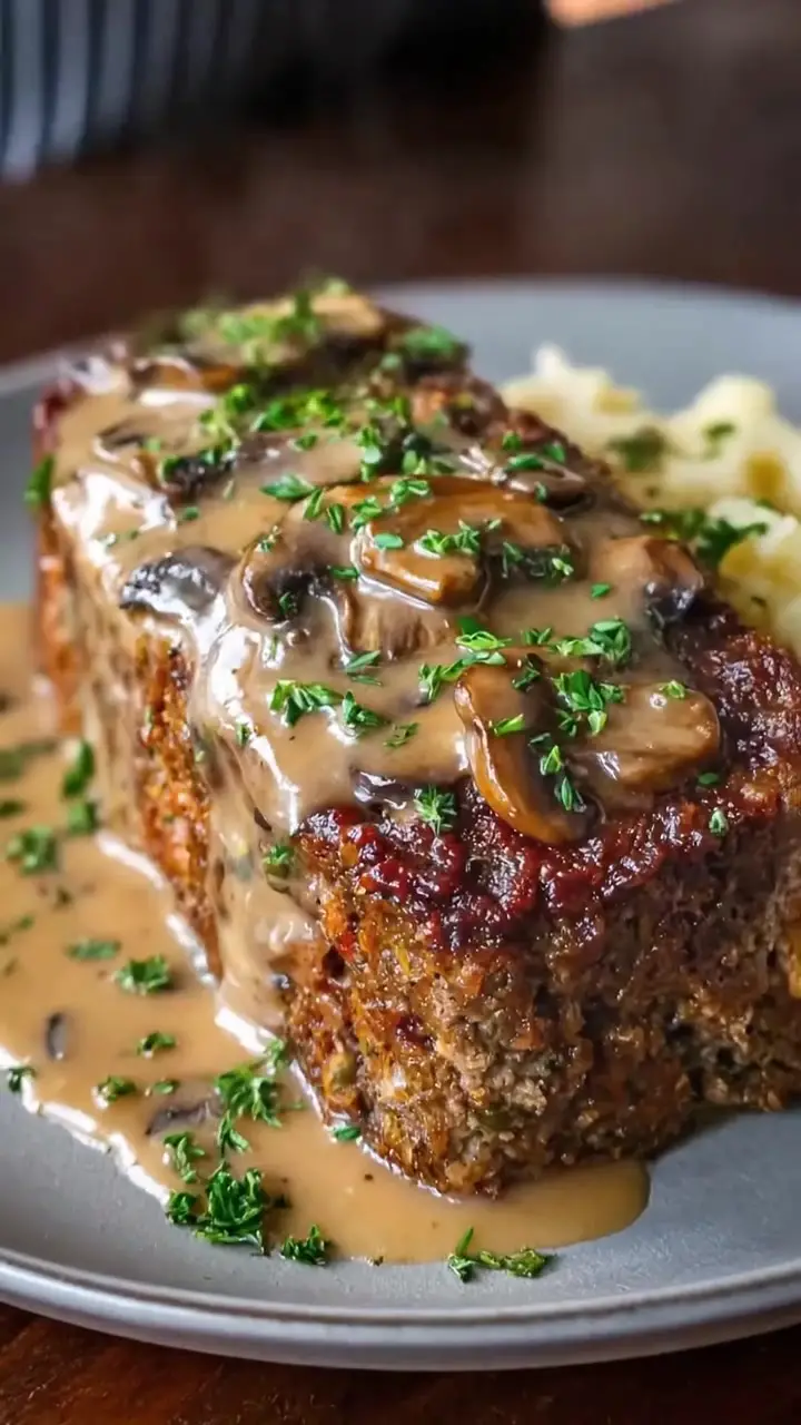 Homemade Meatloaf with Rich and Creamy Mushroom Gravy
