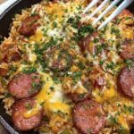 Cheesy Smoked Sausage Rice Skillet