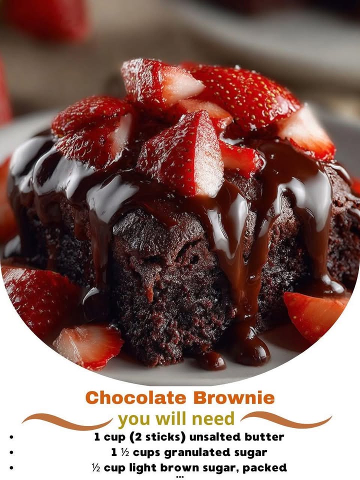 Chocolate Brownie Topped with Chocolate Sauce and Fresh Strawberries